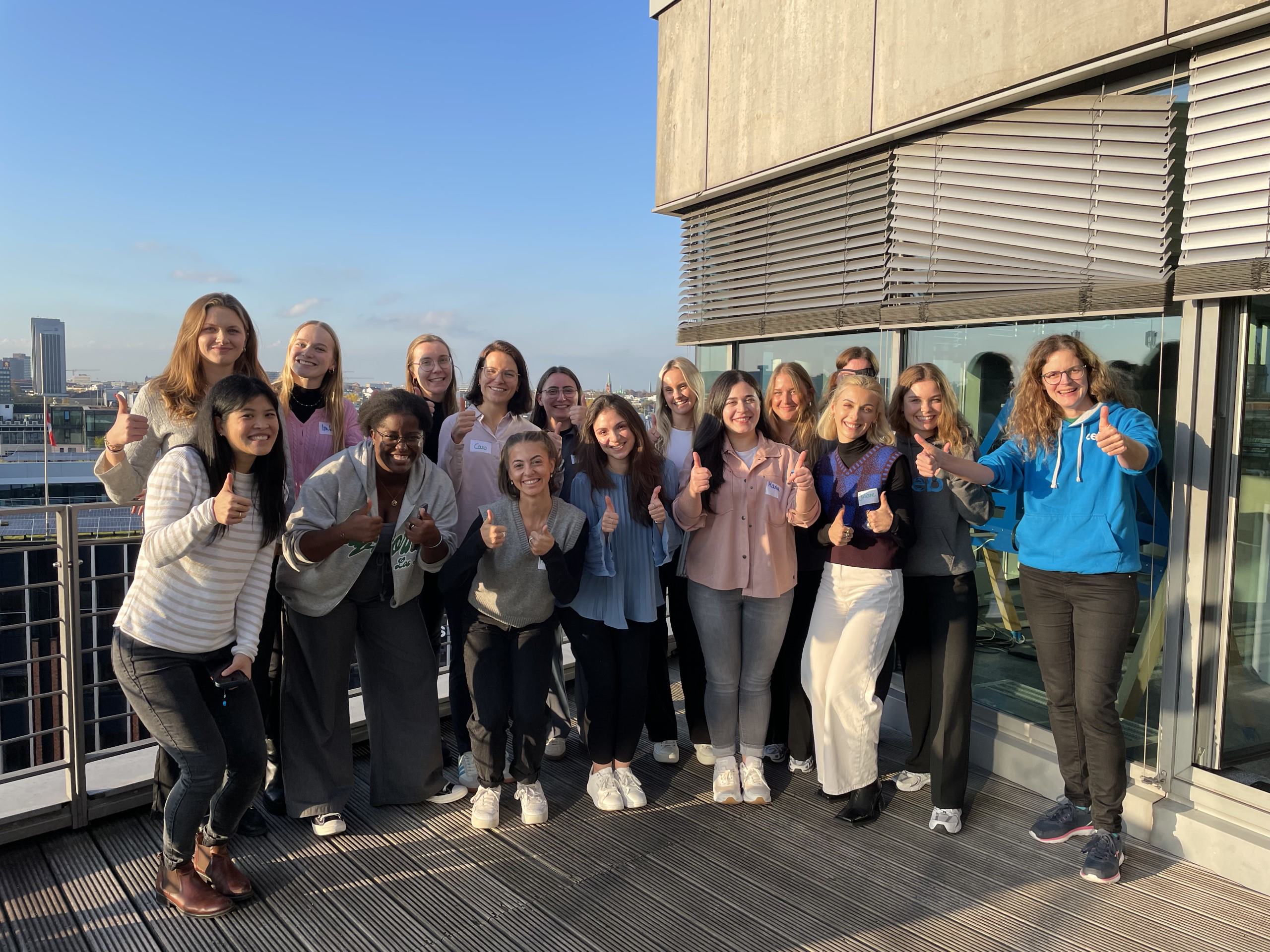 a group of women posing for a photo