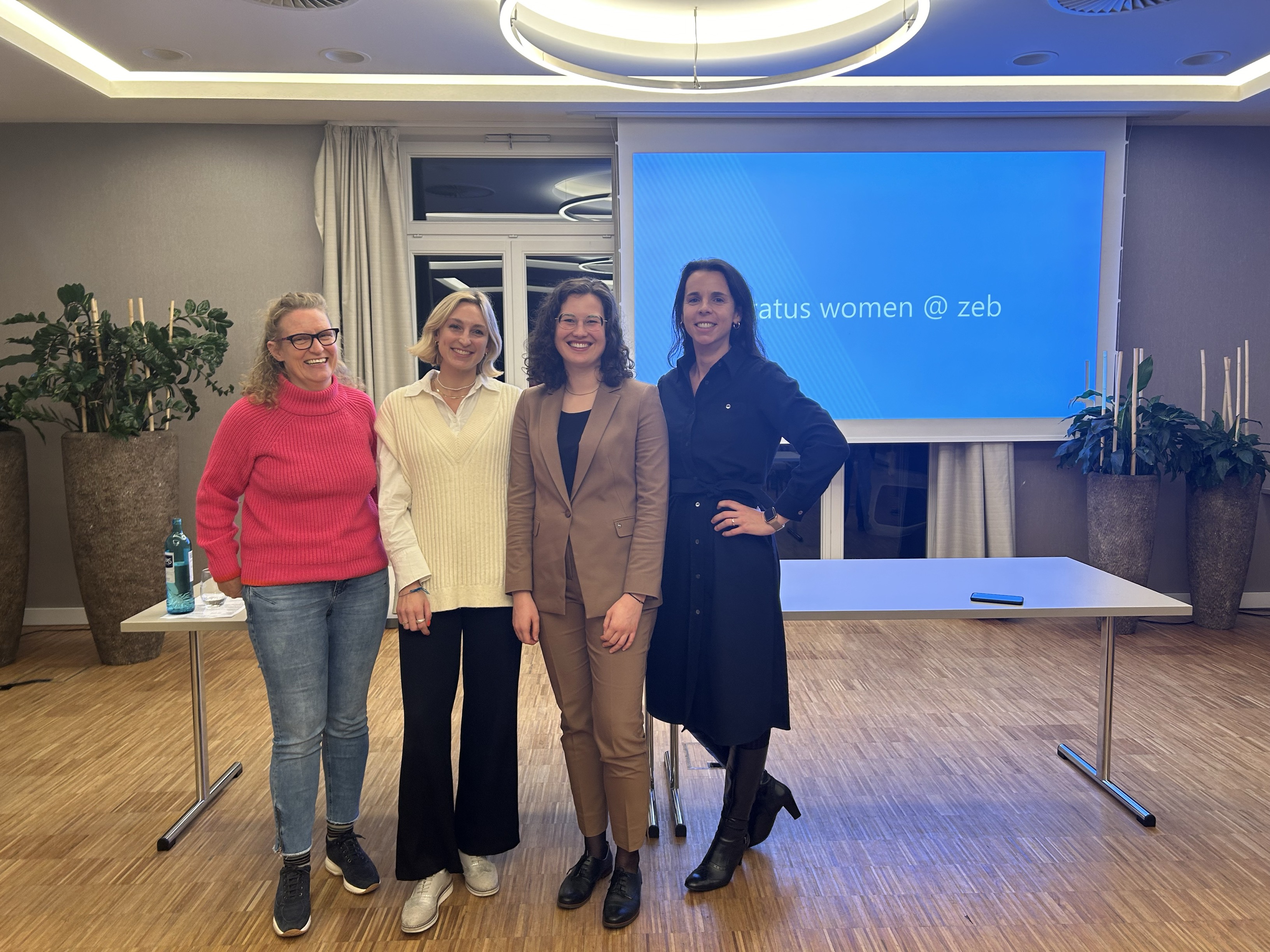 A group of women posing for a photo
