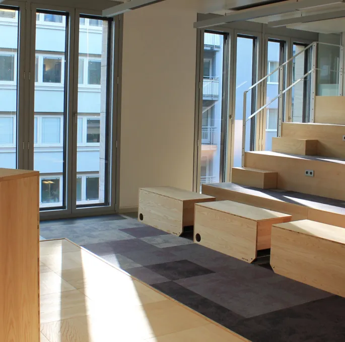 A room with benches and stairs