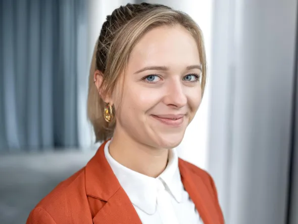 a woman smiling at camera