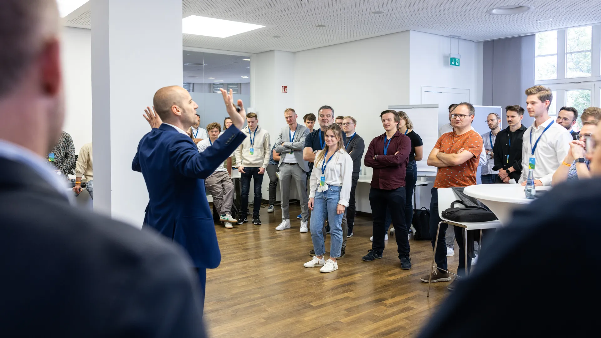 a man standing in front of a group of people