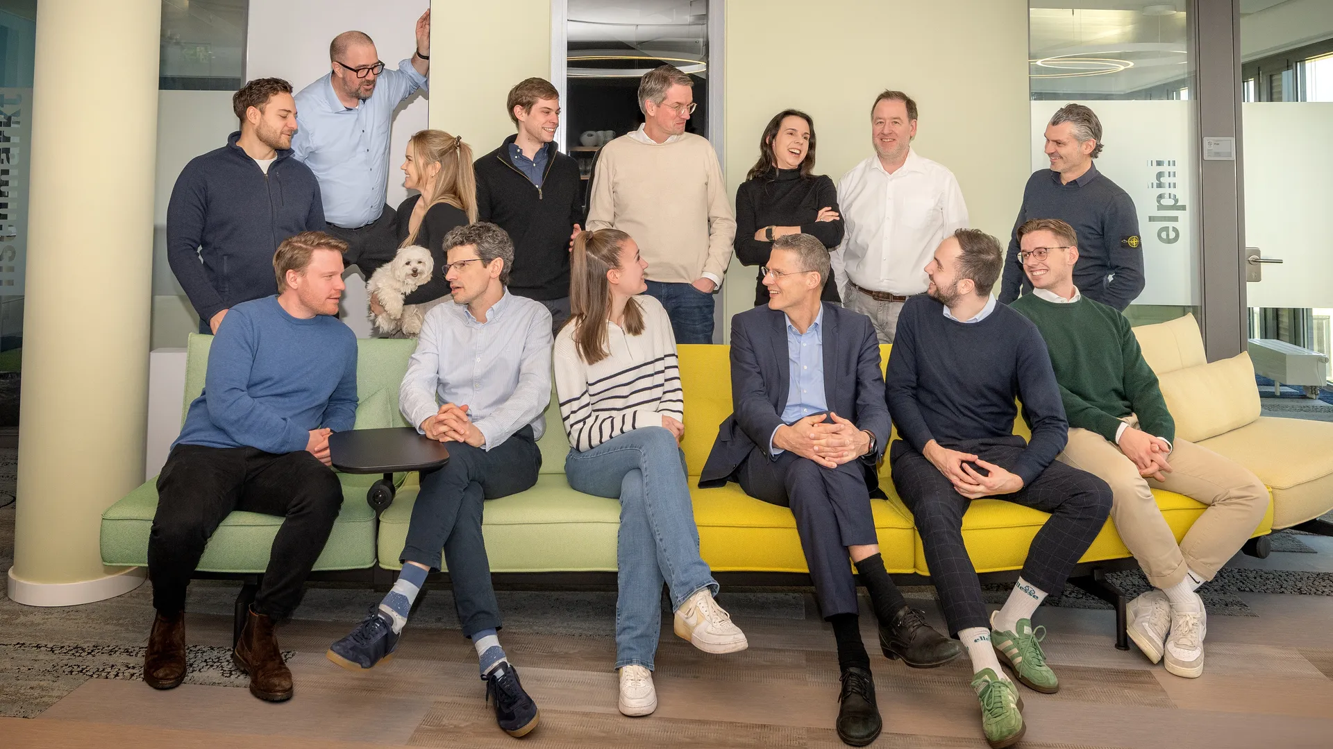 a group of people sitting on a couch