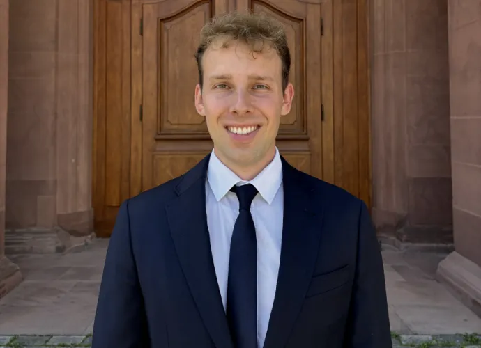 a man in a suit and tie