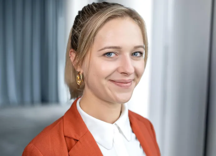a woman smiling at camera