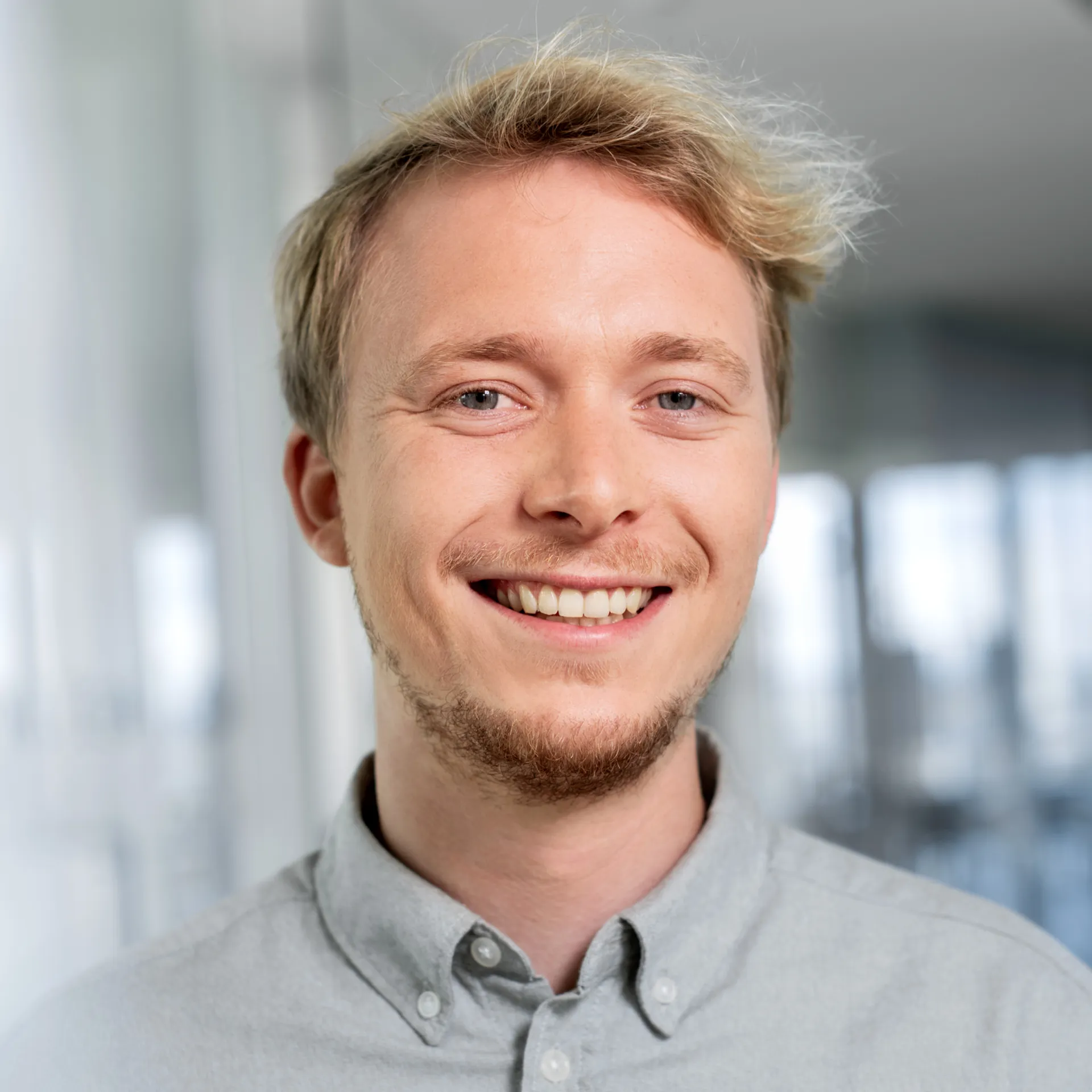 a man smiling at camera