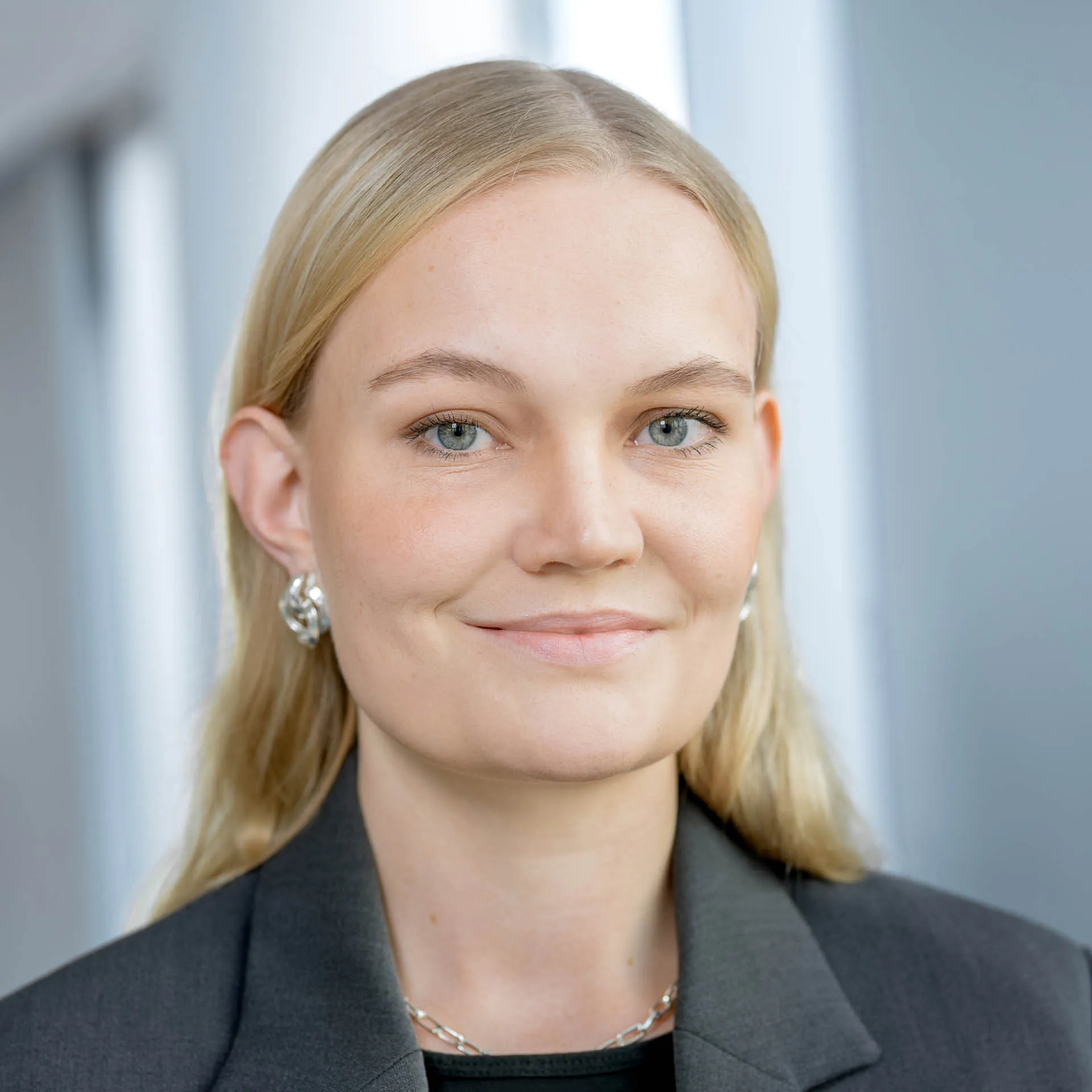 a woman smiling at camera