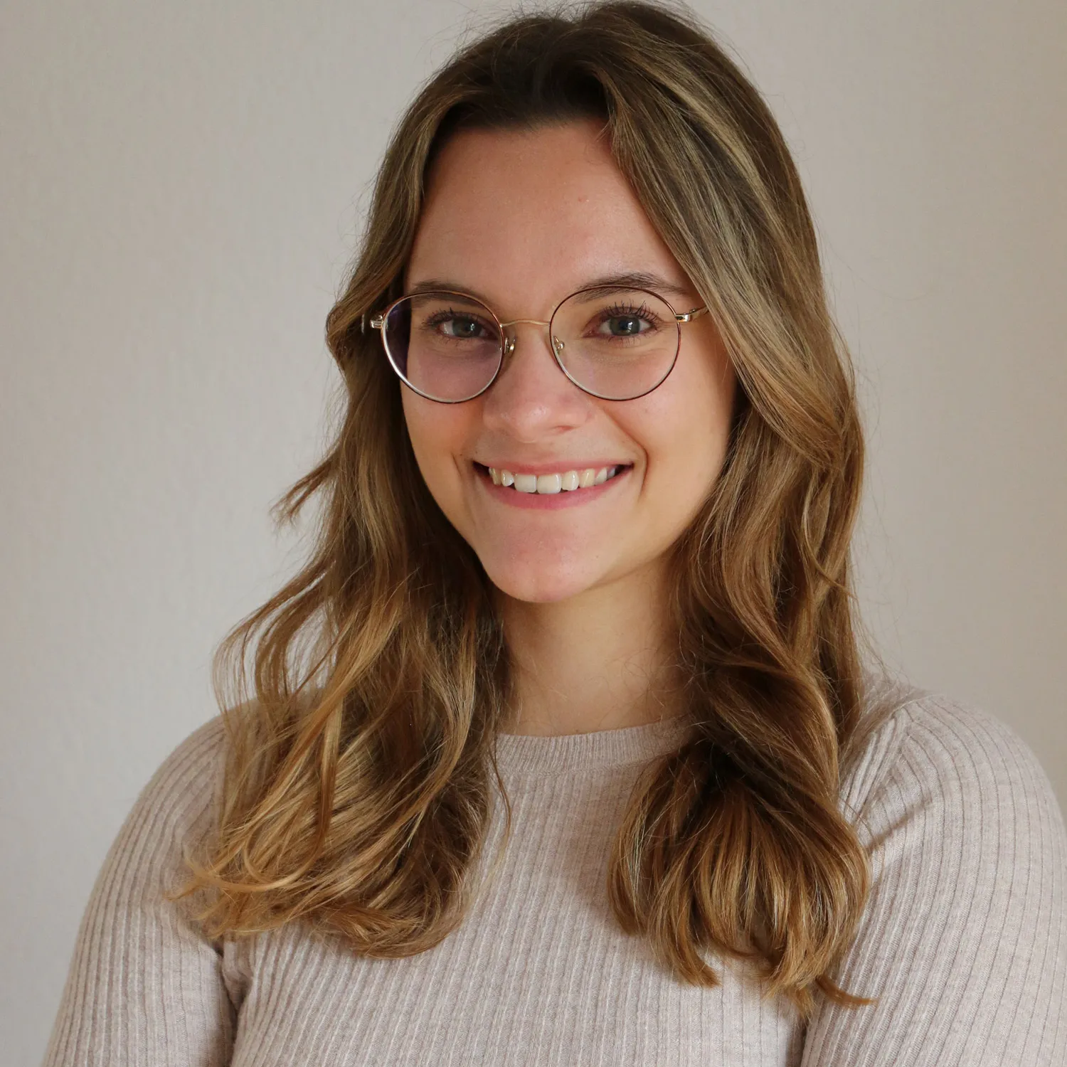 A woman smiling at the camera