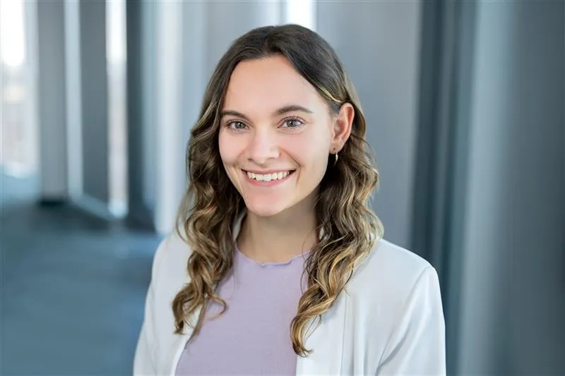 a woman smiling at camera