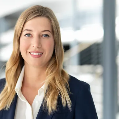 a woman smiling at camera